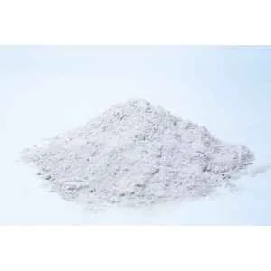 A small mound of Liquid culture mix- Dextrose and Light Malt Extract, a fine light-colored powder, sits on a white surface with a soft white background.