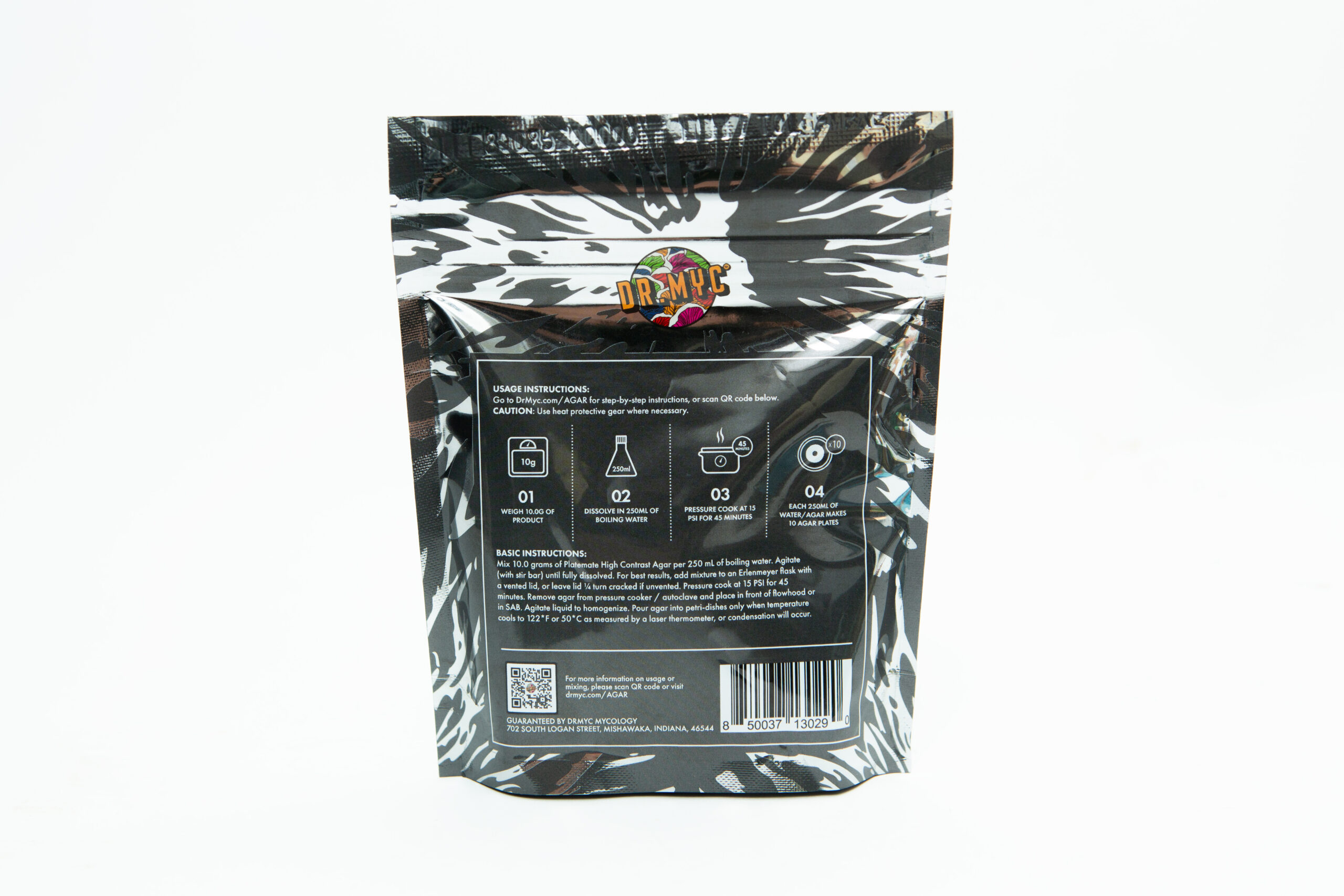 Back of a DRMyc Adaptive Liquid Culture Premix package featuring instructions, helpful icons, and a QR code on a black and white patterned background—perfect for mushroom cultivation enthusiasts.