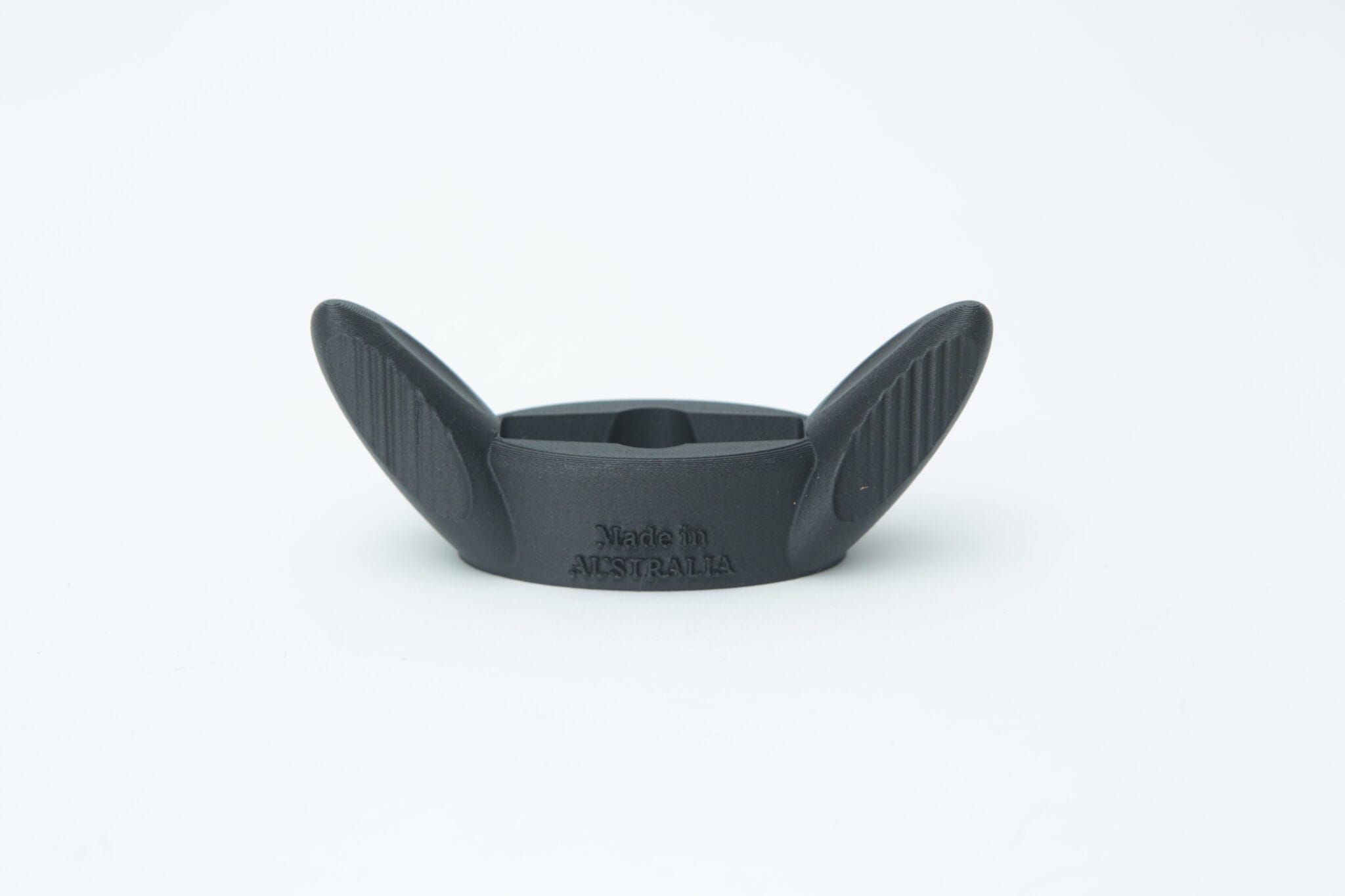 The black, 3D printed Wingnut Wrench for All American Steriliser by Rootlab Original features "Made in Australia" engraved on the front and is displayed against a white background.