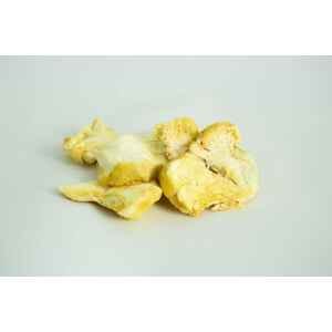 Several pieces of fresh lion’s mane mushroom on a plain white background.