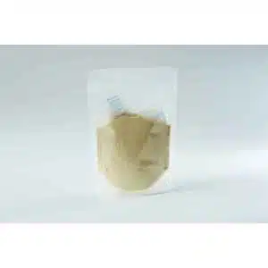 A clear resealable bag filled with beige powder and two silica gel packets inside.
