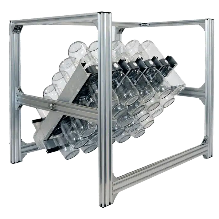 The Plant Cell BioTiltâ„¢ 25 system features glass bottles on a tilted metal rack in a rectangular aluminum frame, perfect for innovative plant cell research.