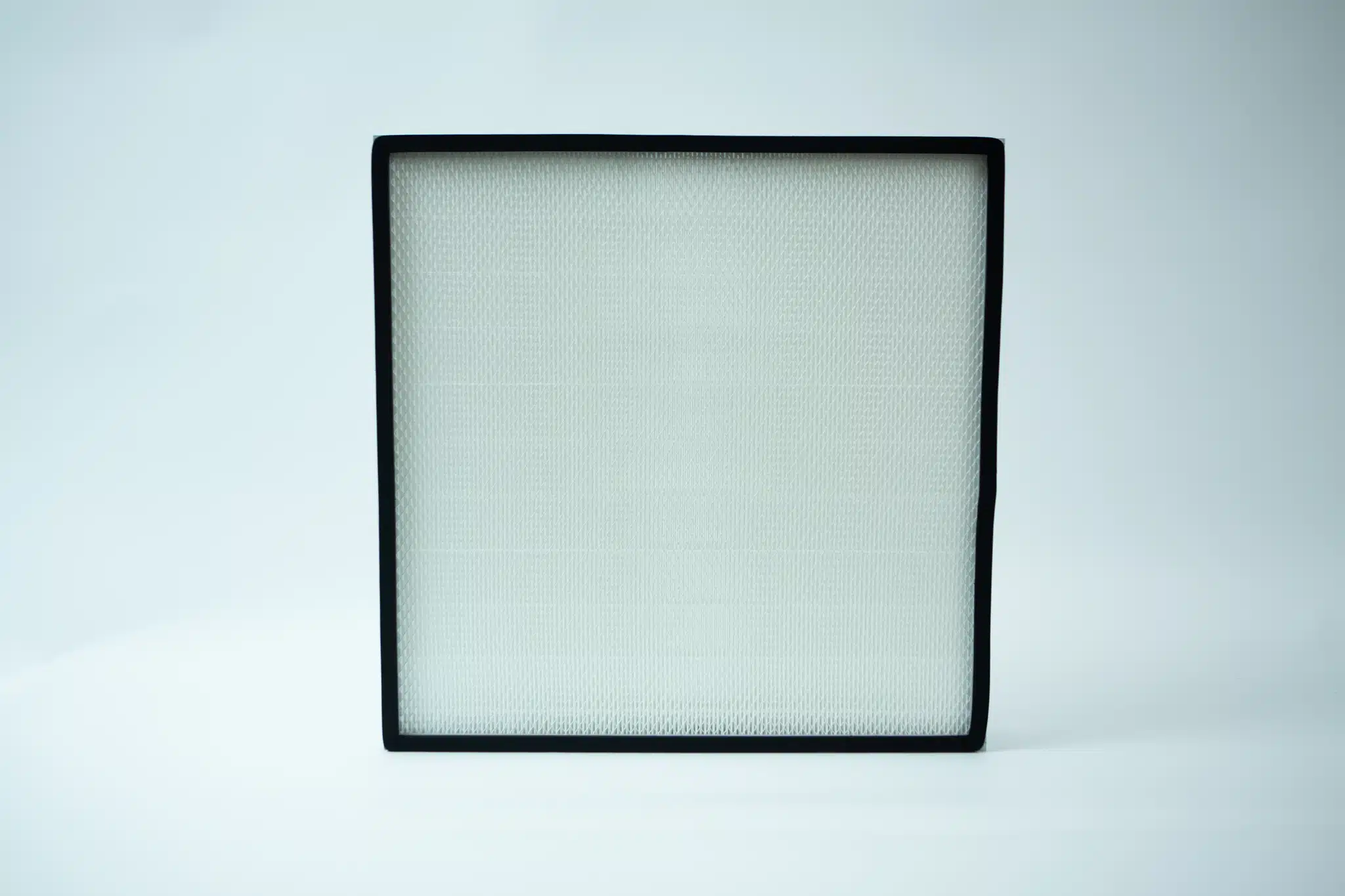 The Laminar Flow Hood HEPA Airfilter H14 w/prefilter 60x60x35cm with a black frame stands upright on a white background.