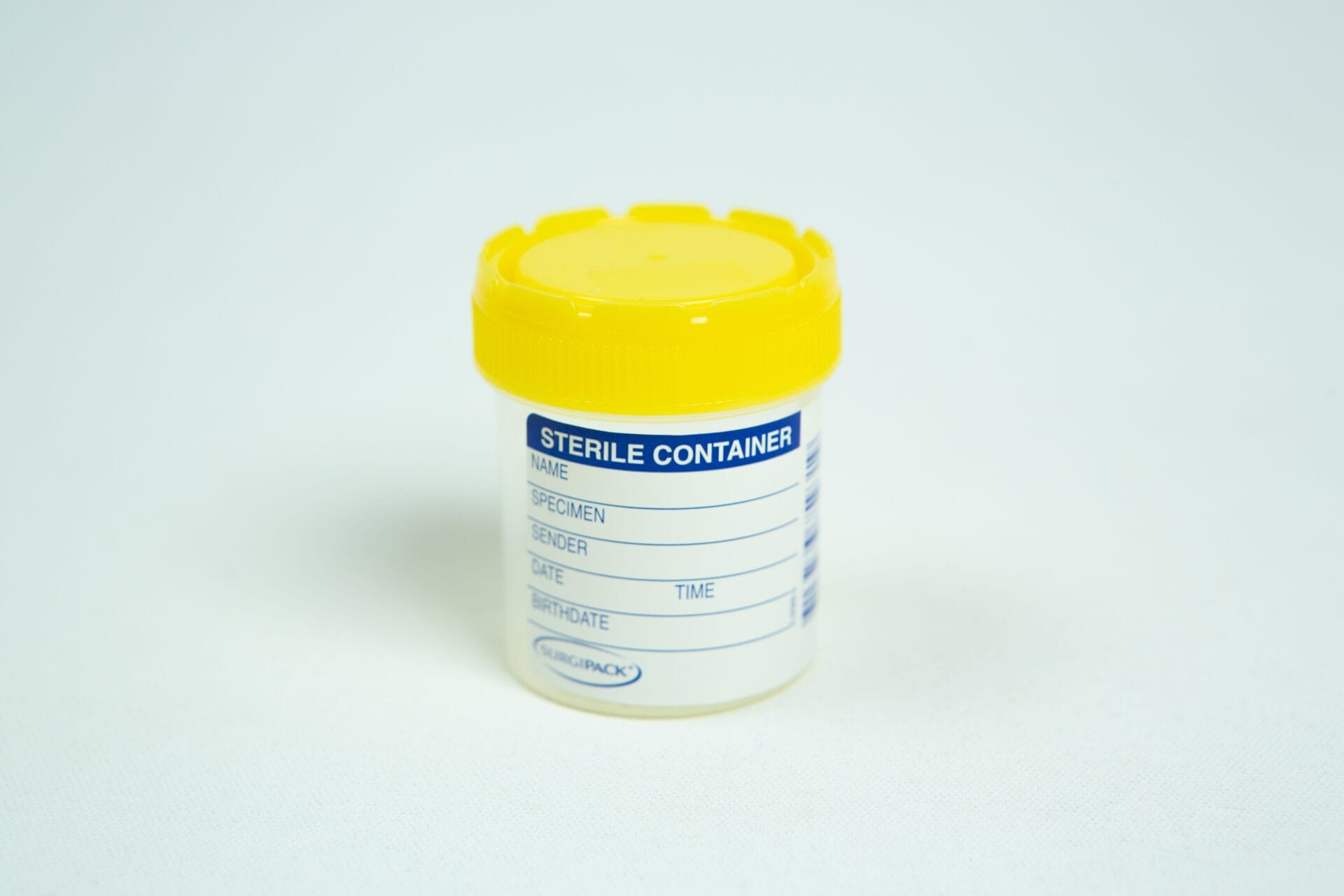 The Spore Print to Spore Syringe Transfer Kit features a sterile specimen container with a yellow lid and labeled area for name, date, and other details—perfect for safely storing spore prints or using as part of your transfer process.