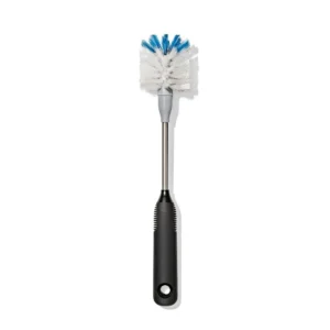 Bottle brush with a black handle and white bristles, tipped with blue, on a white background.